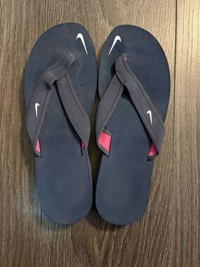 Nike Navy Flip Flops with Pink Lining and White Swoosh